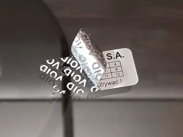 Plomby gwarancyjne na folii srebrnej matowej VOID.